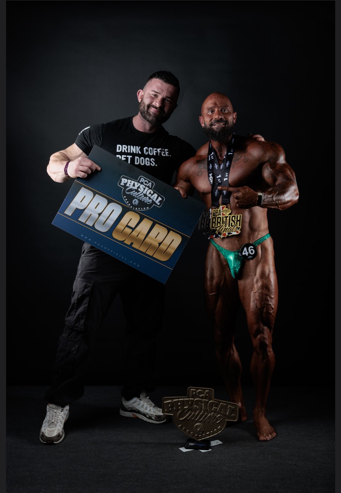 Sam and Dan holding Dan’s PCA Pro Card at the British Finals